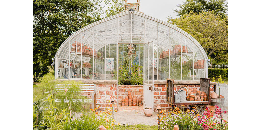 The old-fashioned glasshouse and the kitchen garden